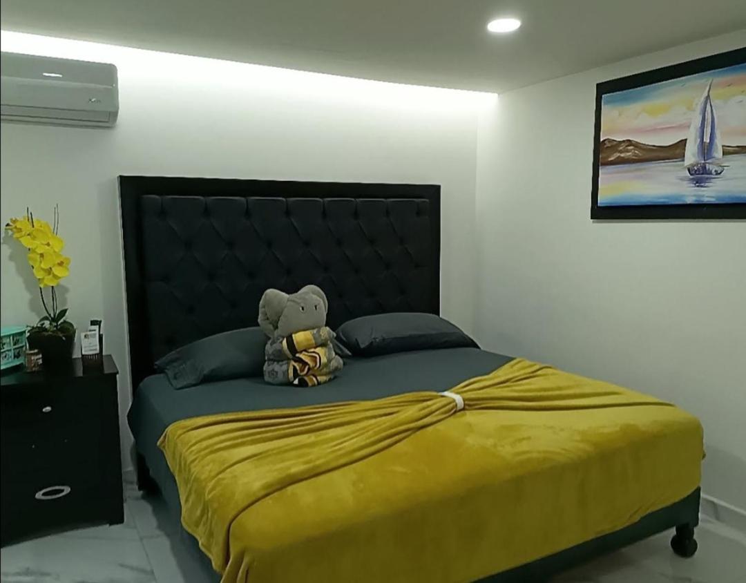 Sunset Suites ماساتلان الغرفة الصورة